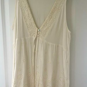 White eyelet and crochet detailed top.